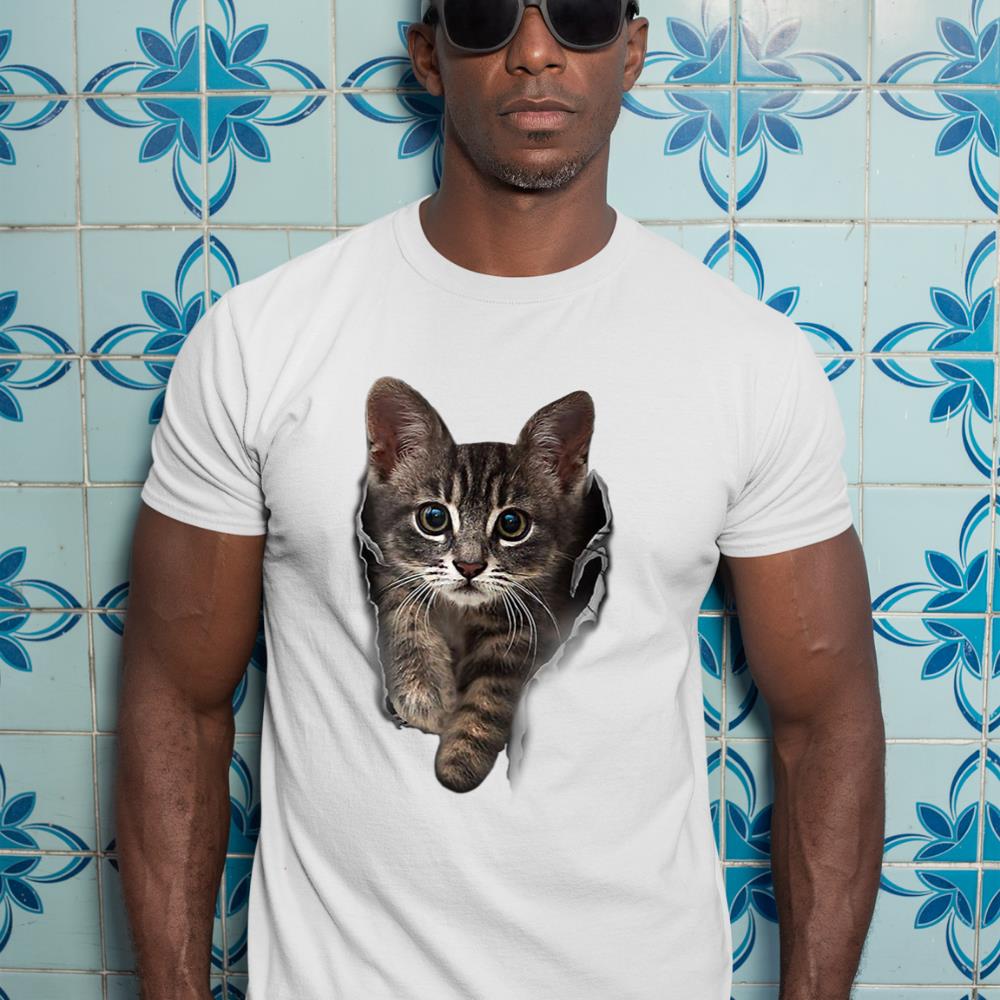 A t-shirt with a realistic and cute graphic of a brown kitten staring.